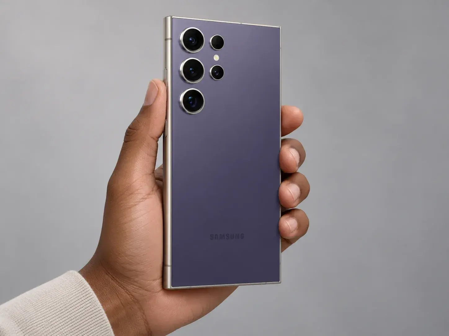 Samsung Galaxy S24 Ultra in Titanium Violet, held in one hand
